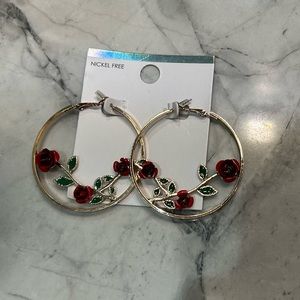 Woman’s rose hoop earrings